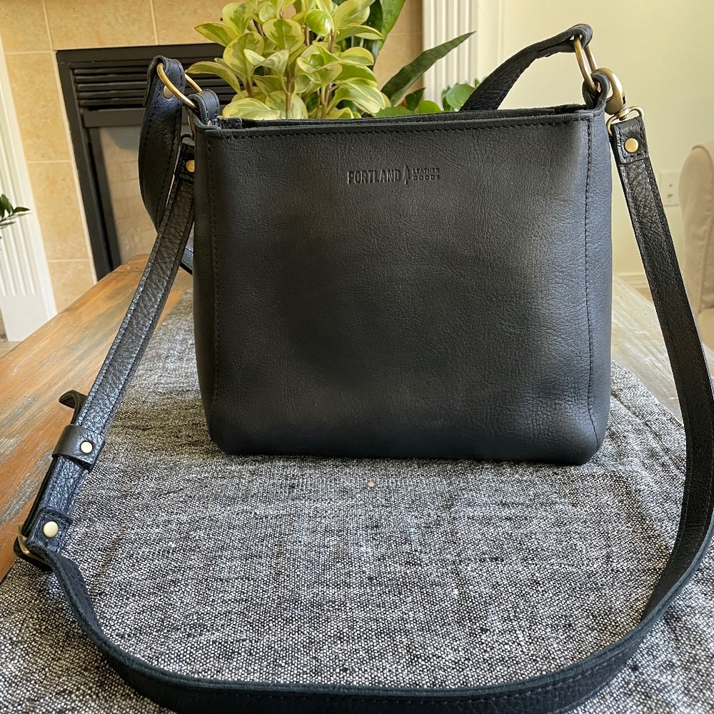 Portland Leather Pebbled Black Leather Triangle bag with the crossbody strap